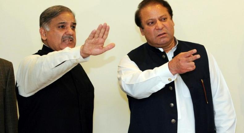 The ruling party has named Nawaz Sharif's (R) younger brother Shahbaz (L) as his successor, but he holds only a provincial seat, so must first enter parliament by contesting the seat left vacant by his elder sibling