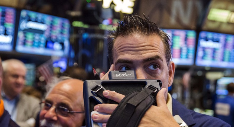 A trader works on the floor of the New York Stock Exchange shortly after the market opened in New York September 4, 2015.