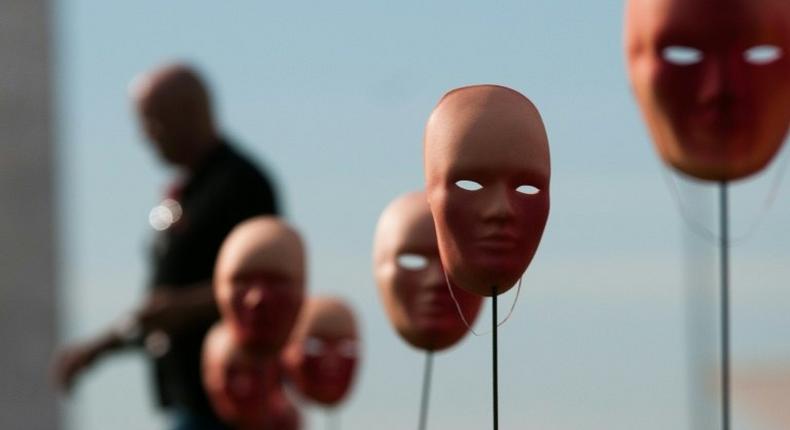 A protest against political corruption scandals in Brazil on Tuesday placed 595 masks -- one for President Michel Temer and each legislator accused -- in front of Congress