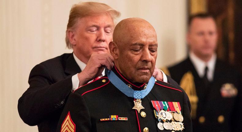 President Donald J. Trump presents the Medal of Honor to retired U.S. Marine Sgt. Maj. John Canley Wednesday, Oct. 17, 2018, in the East Room of the White House. (Official White House Photos by Joyce N. Boghosian)