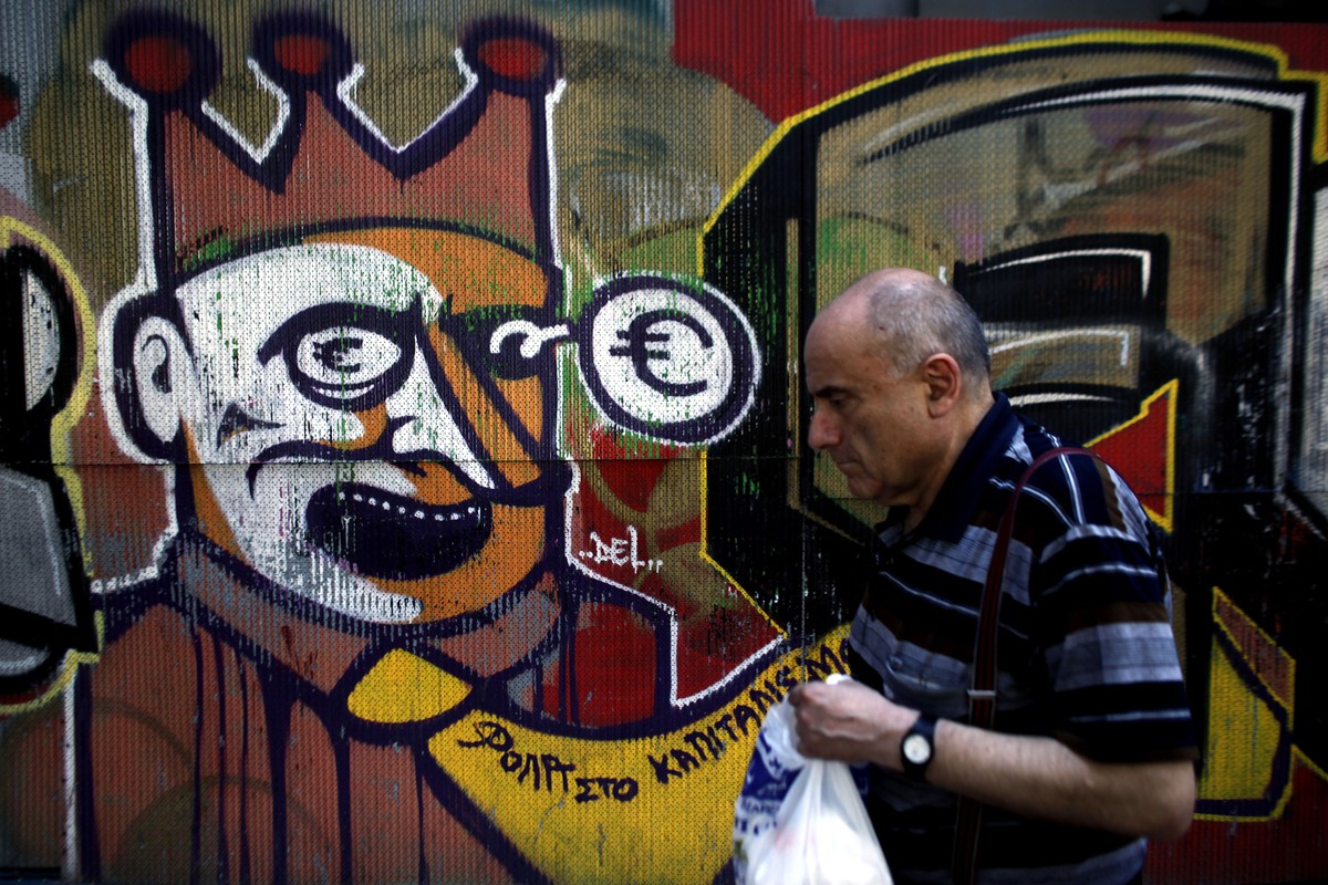 Graffiti związane z kryzysem strefy euro na jednej z ateńskich ulic, Grecja.