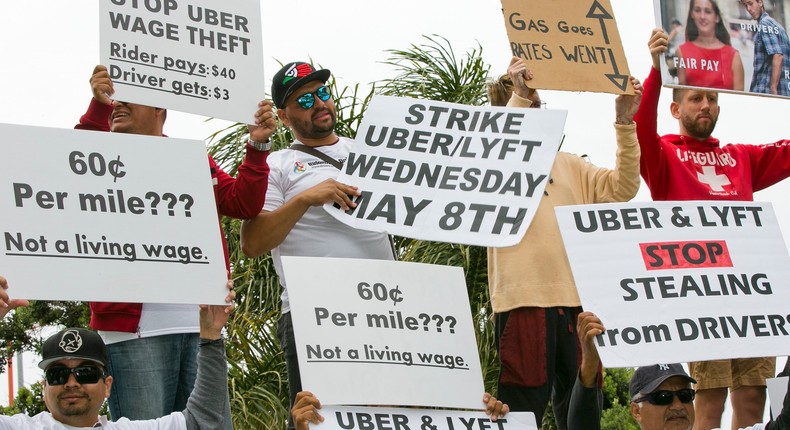 Minneapolis is on the verge of guaranteeing Uber and Lyft drivers higher pay. Uber and Lyft have threatened to leave the city if the ordinance passes. AP Photo/Damian Dovarganes