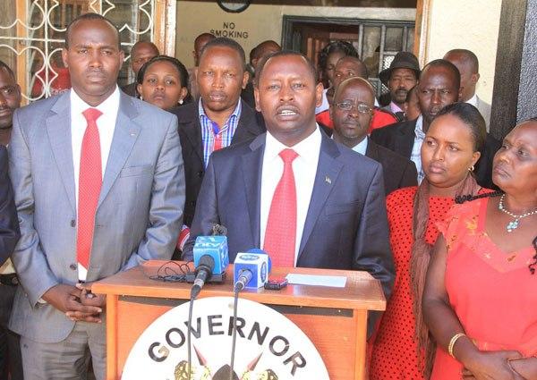 Samburu County Governor Moses Lenolkulal addresses a press conference at Maralal town. 