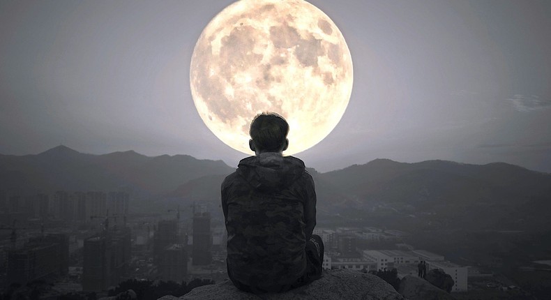 Gazing at the moon while meditating may help you feel more relaxed, present, and connected to nature.Wn Qing Ma / EyeEm / Getty Images