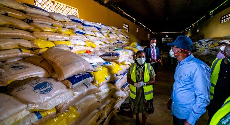 Governor Babajide Sanwo-Olu inspects the facility where the economic stimulus packages are kept. [Twitter/@jidesanwoolu]