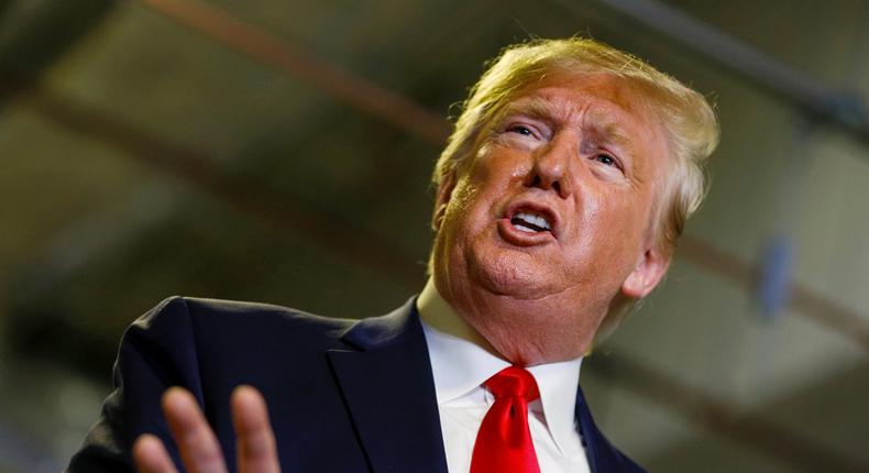 FILE PHOTO: U.S. President Donald Trump speaks during a tour of Apple's Mac Pro manufacturing plant in Austin, Texas, U.S., November 20, 2019. REUTERS/Tom Brenner/File Photo