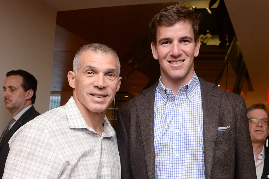 Here's Yankees manager Joe Girardi with New York Giants quarterback Eli Manning.