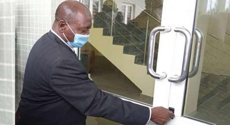 The Lagos CJ, Justice Kazeem Alogba, opening the door to the newly built Osbourne Courthouse on Thursday