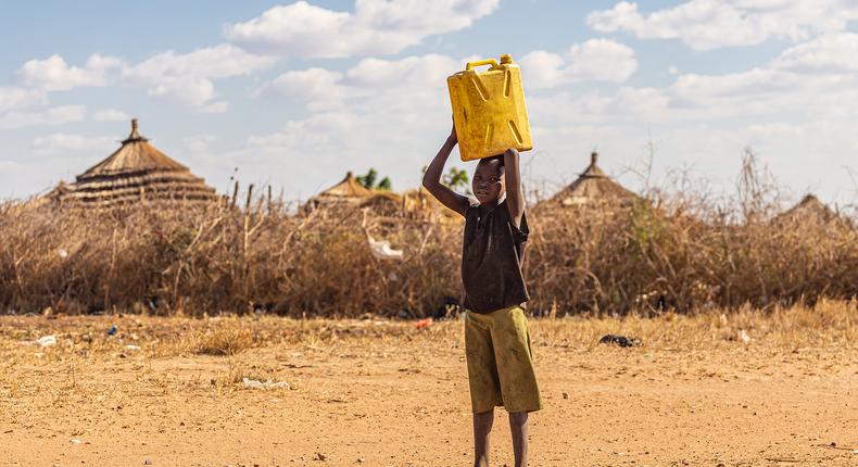 A child in of the Karamoja district fetching water. (Photo credit: www.pasapusu.cz)