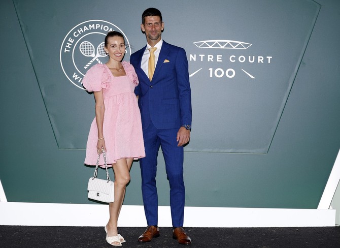 Jelena i Novak Đoković na Vimbldonskoj večeri u Londonu foto:  Steven Paston/PA Images