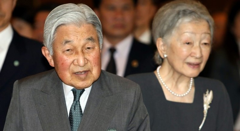 Japan's Emperor Akihito and Empress Michiko arrive for a meeting in Hanoi with family members of Japanese veterans living in Vietnam on March 2, 2017