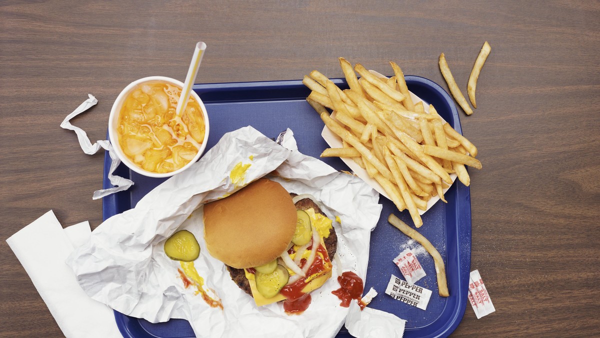 Elevated View of a Tray With Fries, a Hamburger and Lemonade