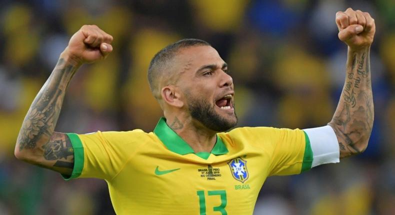 Captain Dani Alves celbrates after Brazil defeat Peru to win their ninth Copa America