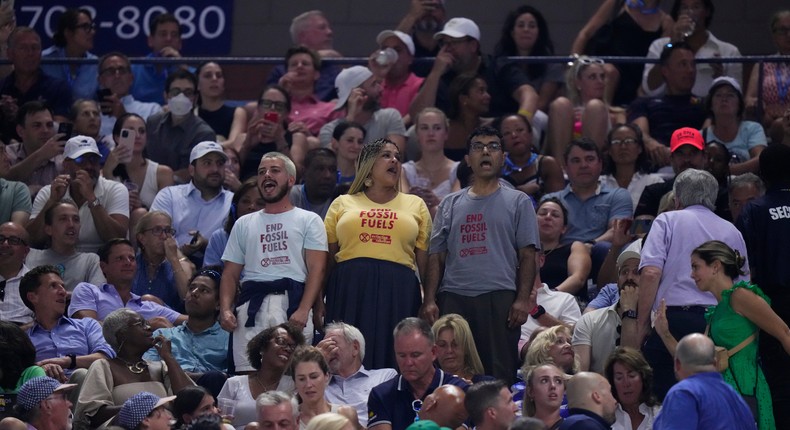 Protesters demonstrate at a match between Coco Gauff and Karolina Muchova during the women's singles semifinals of the US Open tennis championships on Thursday.AP Photo/Frank Franklin II