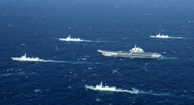 A Chinese navy formation, including the aircraft carrier Liaoning (C), during military drills in the South China Sea on January 2, 2017