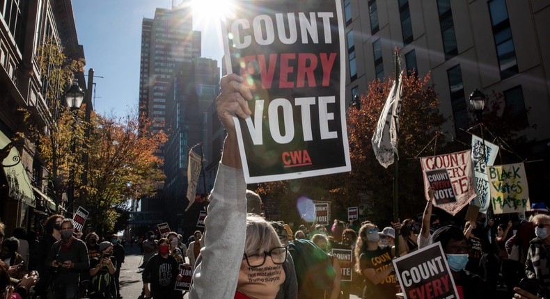 A woman participates in a protest in support of counting all votes in Philadelphia, Pennsylvania, on November 5, 2020.