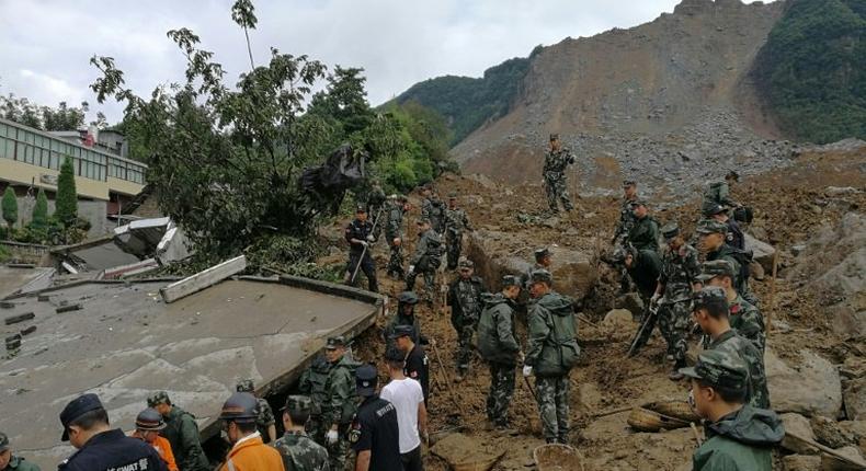 Rescuers are continuing to search for those missing after Monday's disaster in a township in Bijie city in Guizhou province