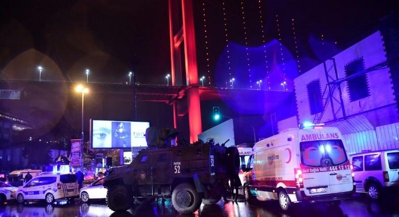 Turkish special force police officers and ambulances are seen at the site of an armed attack at the Reina nightclub in Istanbul on January 1, 2017