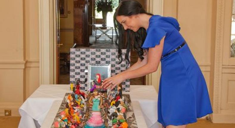 The world's most expensive cake created by top fashion designer, Debbie Wingham, who turned to baking after creating the world's most expensive dress for £11.5million from black and red diamonds.