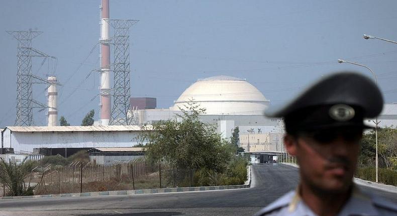 An Iranian security guard stands in front of the Bushehr nuclear power plant in southern Iran in August 2010.
