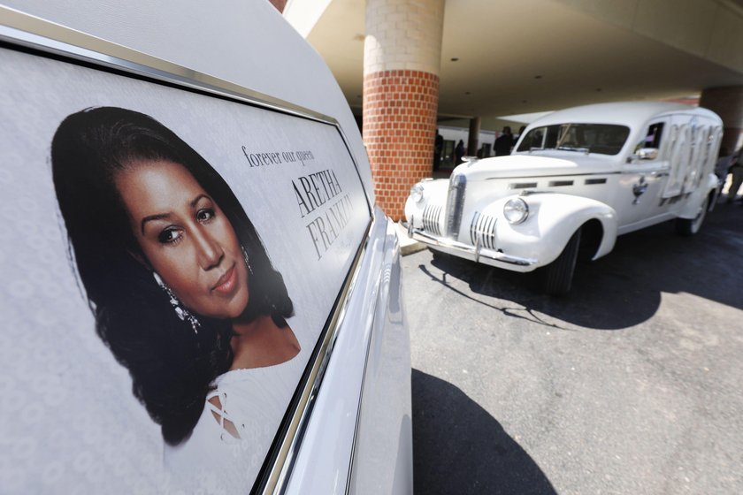 Flowers are seen on the casket of the late singer Aretha Franklin as it is laid to rest at her buria