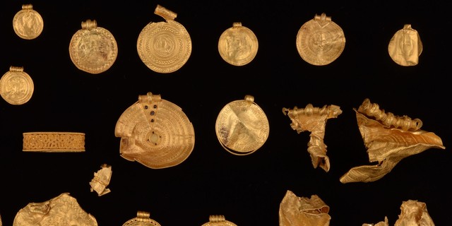 Gold medallions, coins, and jewelry comprise an Iron Age hoard that a rookie metal detectorist recently discovered in Denmark.
