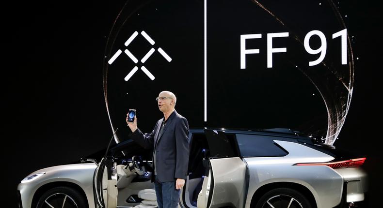 Nick Sampson, Faraday Future's senior vice president of product research & development, introduces the FF 91 electric car during a news conference at the CES International on Tuesday, Jan. 3, 2017, in Las Vegas.
