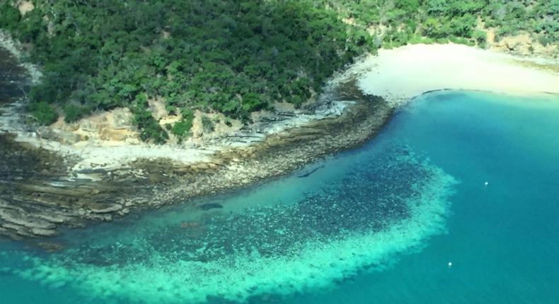 This undated handout photo received on April 6, 2020 from the ARC Centre of Excellence for Coral Reef Studies at James Cook University shows an aerial survey of coral bleaching on the Great Barrier Reef