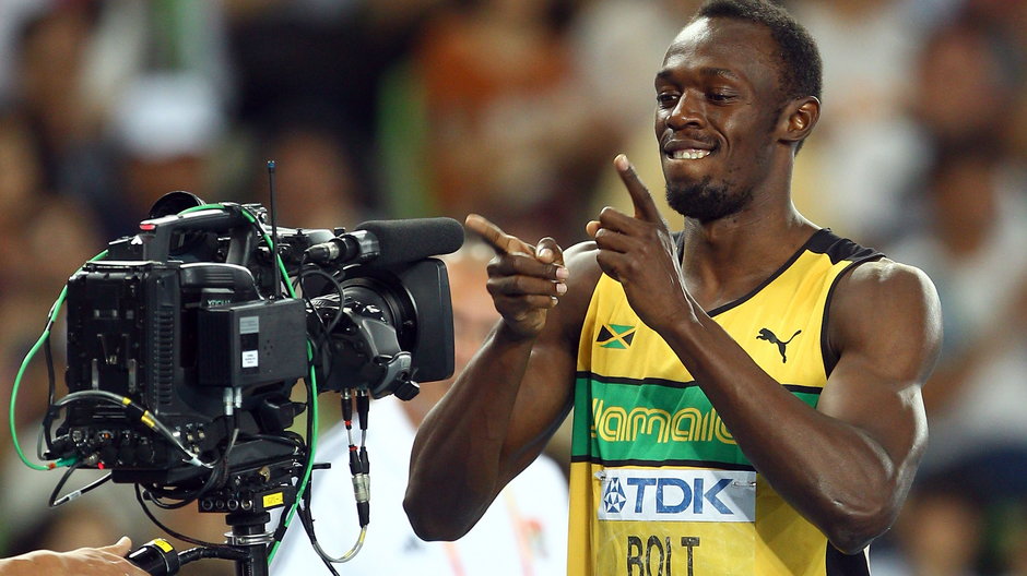 Jeden z bohaterów igrzysk olimpijskich - Usain Bolt i kamera telewizyjna