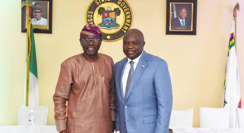 Lagos governor, Akinwunmi Ambode (right), has congratulated his elected successor, Babajide Sanwo-Olu (left)