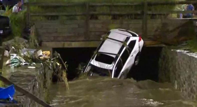 Two dead as flood tears through Maryland downtown