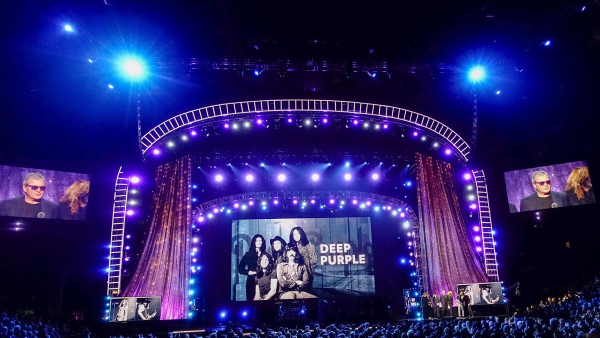 People listen to Gillan of Deep Purple speaks onstage at the 31st annual Rock and Roll Hall of Fame Induction Ceremony at the Barclays Center in Brooklyn