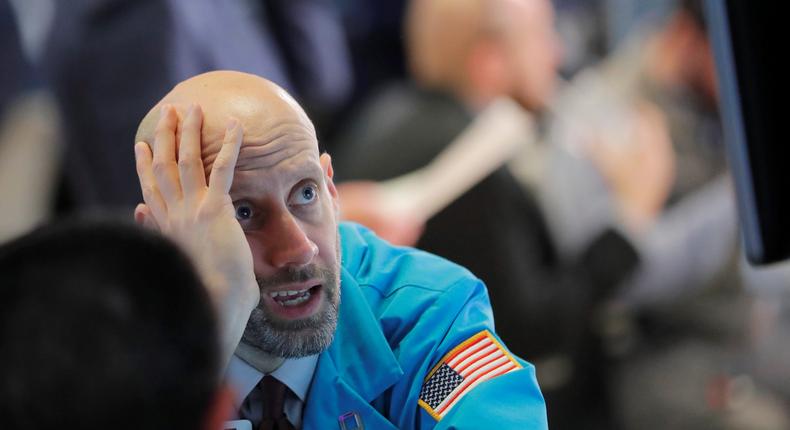 Traders work on the floor of the New York Stock Exchange shortly before the closing bell as the market takes a significant dip in New York, U.S., February 25, 2020.