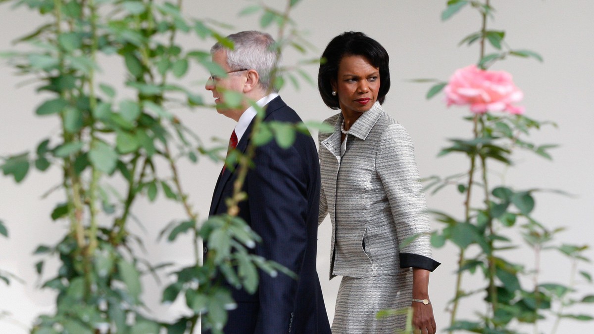 U.S. Secretary of State Rice walks with White House Chief of Staff Bolton at the White House in Wash