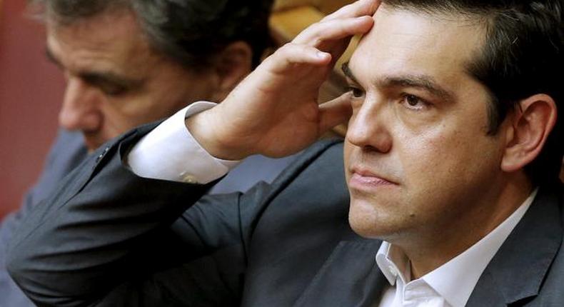 Greek PM Tsipras sacks leftist party rebels in reshuffle