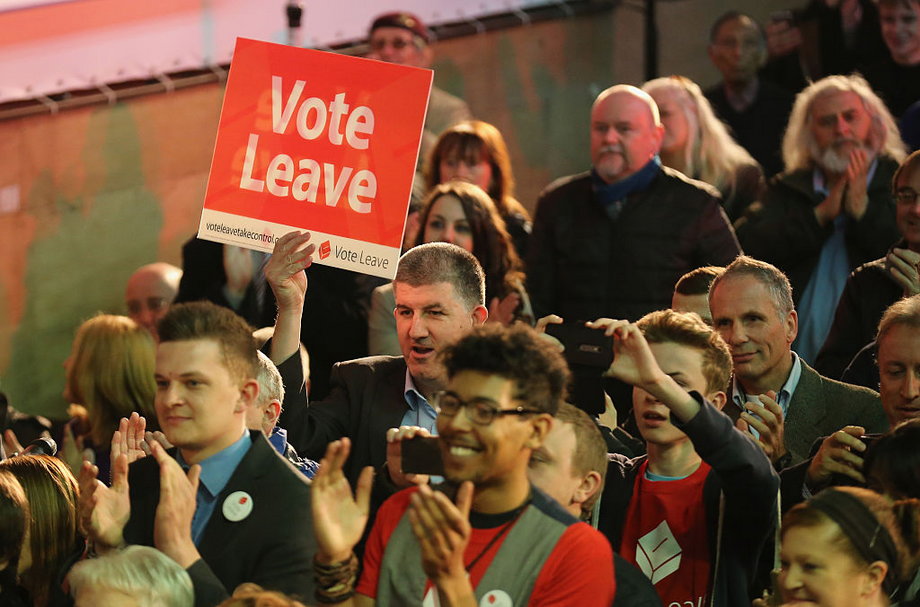 Vote Leave supporters wait for London Mayor Boris Johnson to address campaigners during a rally for the 'Vote Leave' campaign on April 15, 2016 in Manchester, England. Boris Johnson is taking part in a 48 hour 'Brexit Blitz' of campaigning in Northern England. Britain will vote either to leave or remain in the EU in a referendum on June 23.