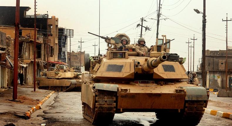 US Army M1A2 Abrams tanks conduct a combat patrol in the city of Tall Afar, Iraq, on February 3, 2005.