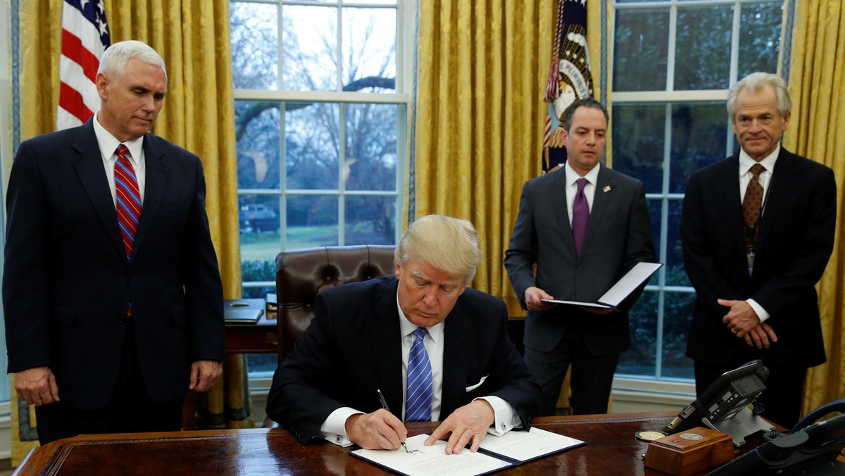 President Trump signs executive orders at the White House in Washington