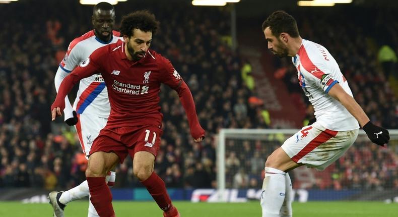 Liverpool's Mohamed Salah ensured the leaders cemented pole position against Crystal Palace
