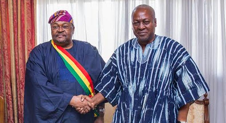 President John Mahama of Ghana (right) to Dr Mike Adenuga Jr: Congratulations for being a worthy son of Africa