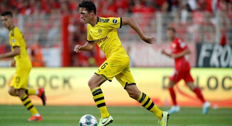 Borussia Dortmund midfielder Thomas Delaney (R) is expected to be out until January after tearing ankle ligaments on international duty with Denmark