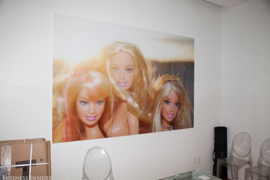 Oversize photographs of Barbie (taken by interior designer Jennifer Esposito, a friend of Brod's) grace the walls in various conference rooms and private offices.