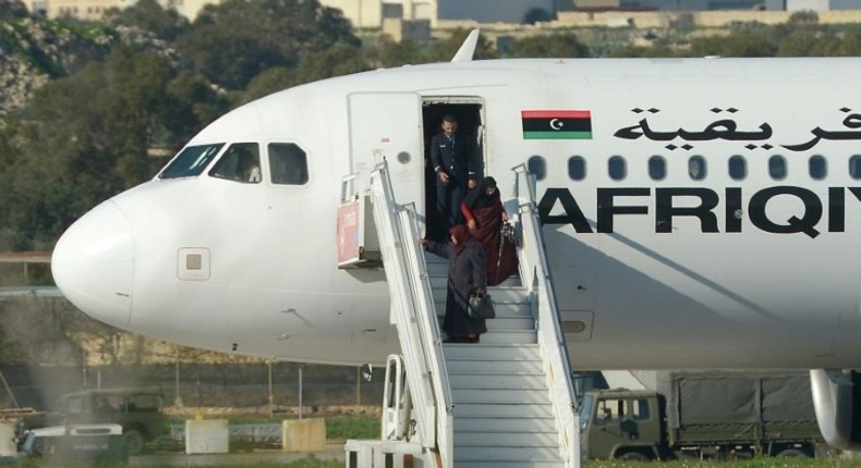 A group of hostages is released from a hijacked Afriqiyah Airways plane in Malta on December 23, 2016