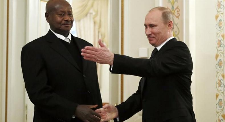 Russian President Vladimir Putin meets Uganda's President Yoweri Museveni 