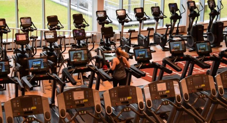 Members return to World Class Laugar, one of Iceland's biggest gyms, after the goverment lifted more coronavirus restrictions on Monday