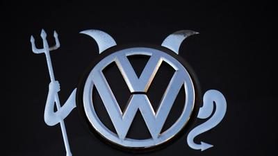 Volkswagen logo spaliny