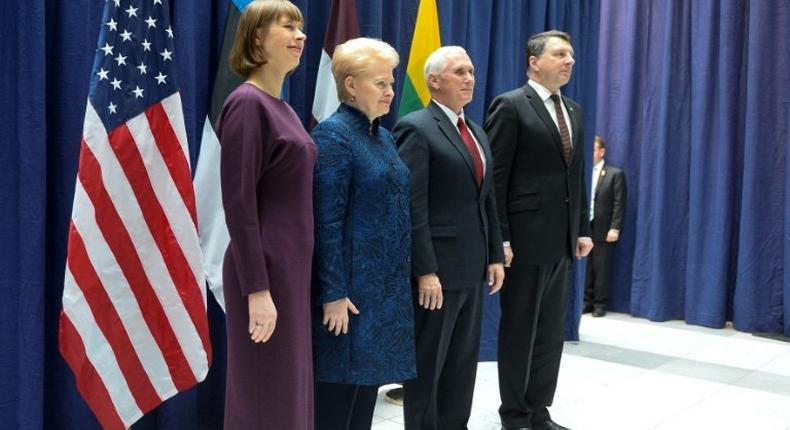 (R-L) Latvia’s President Raimonds Vejonis, US Vice President Michael Pence, Lithuania’s President Dalia Grybauskaite and Estonia’s President Kersti Kaljulaid pose ahead of talks at the 53rd Munich Security Conference in Munich on February 18, 2017