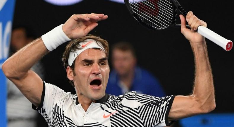 Switzerland's Roger Federer celebrates victory against Japan's Kei Nishikori in the fourth round of the Australian Open in Melbourne on January 22, 2017