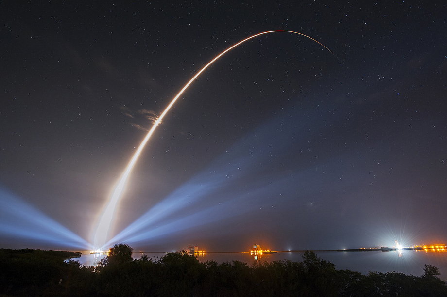 A United Launch Alliance Atlas V rocket carrying the third Mobile User Objective System satellite for the US Navy creates a light trail as it lifts off, January 20, 2015