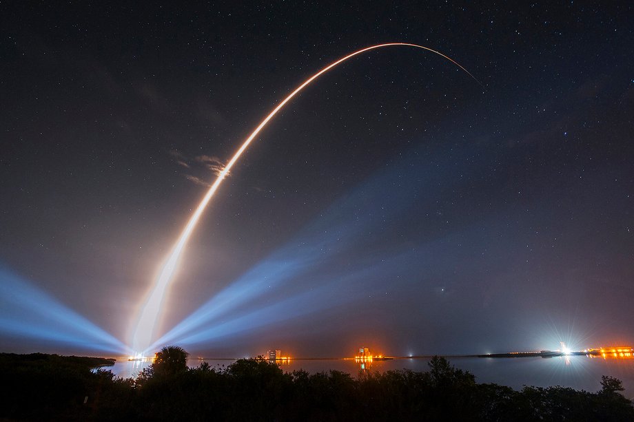 A United Launch Alliance Atlas V rocket carrying the third Mobile User Objective System satellite for the US Navy creates a light trail as it lifts off, January 20, 2015